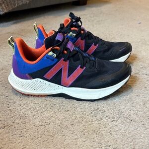 New Balance Black Sneakers with Purple and Orange Accents